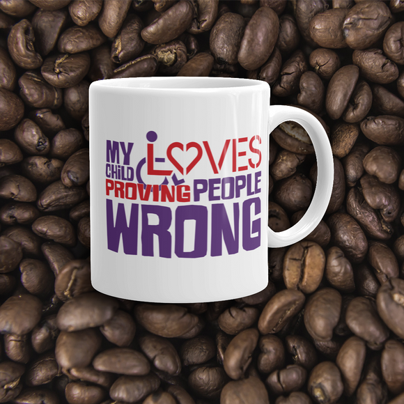 Coffee mug my child loves proving people wrong special needs parent parenting expectations disability special needs awareness wheelchair