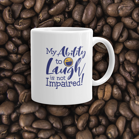 coffee mug my ability to laugh is not impaired fun happy happiness quality of life impairment disability disabled wheelchair positive